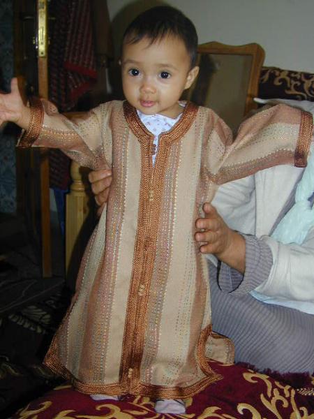*pose photo* Comme ca , c'est bien papa?